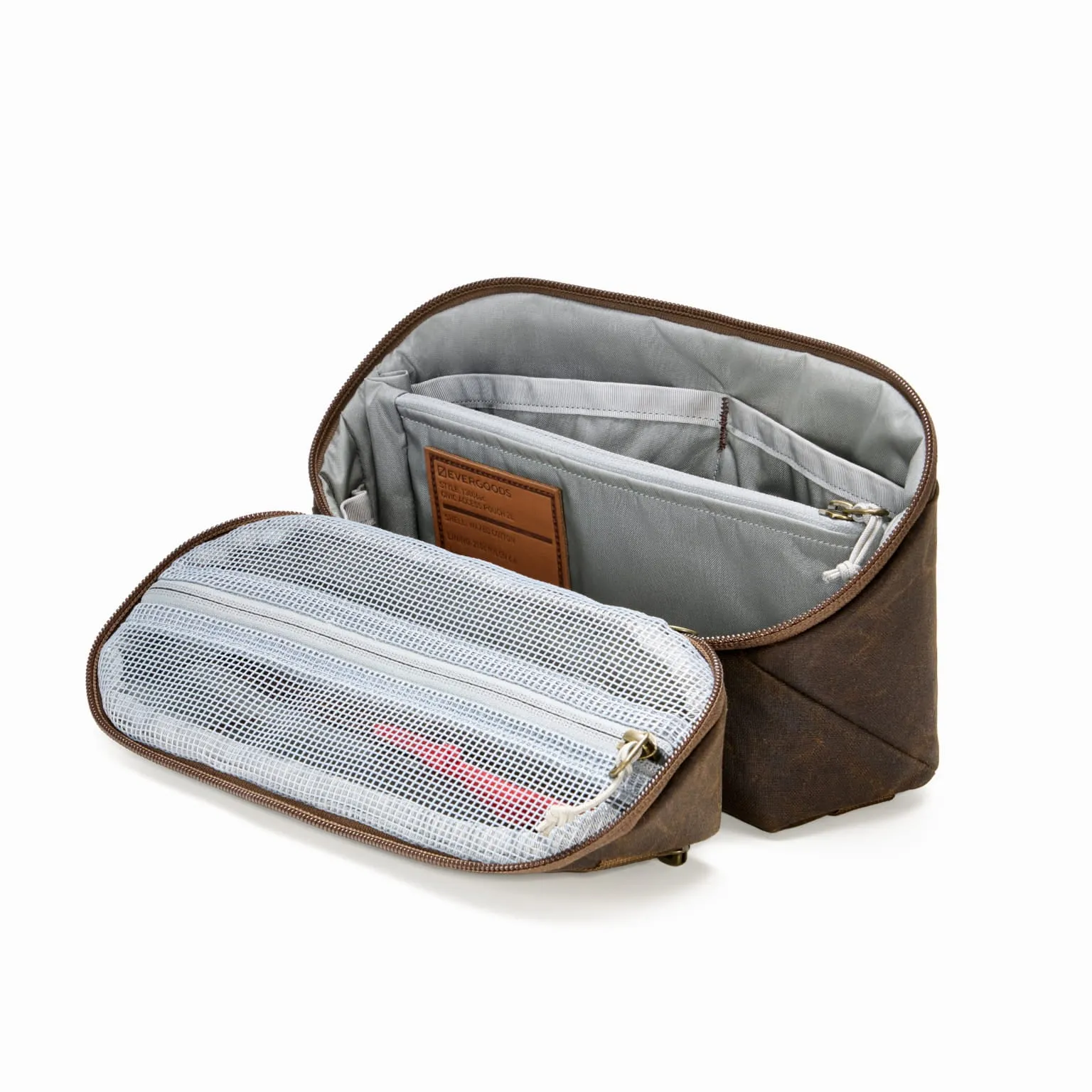 Official product photograph showing the open waxed-canvas CIVIC Access Pouch 2L, grey dividers and mesh lid pocket.